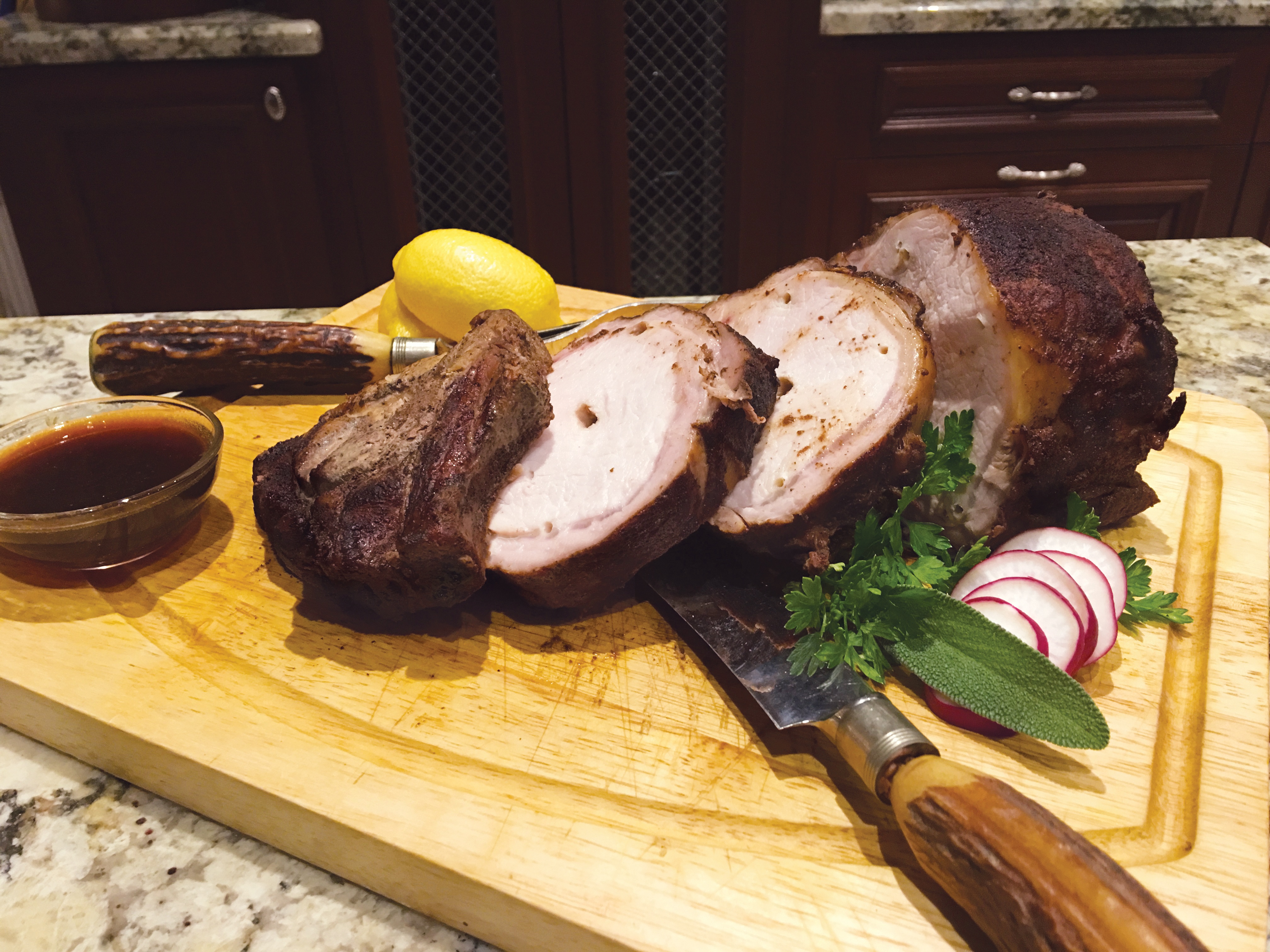 How to Make a Rotisserie Pork Rib Roast in your Backyard